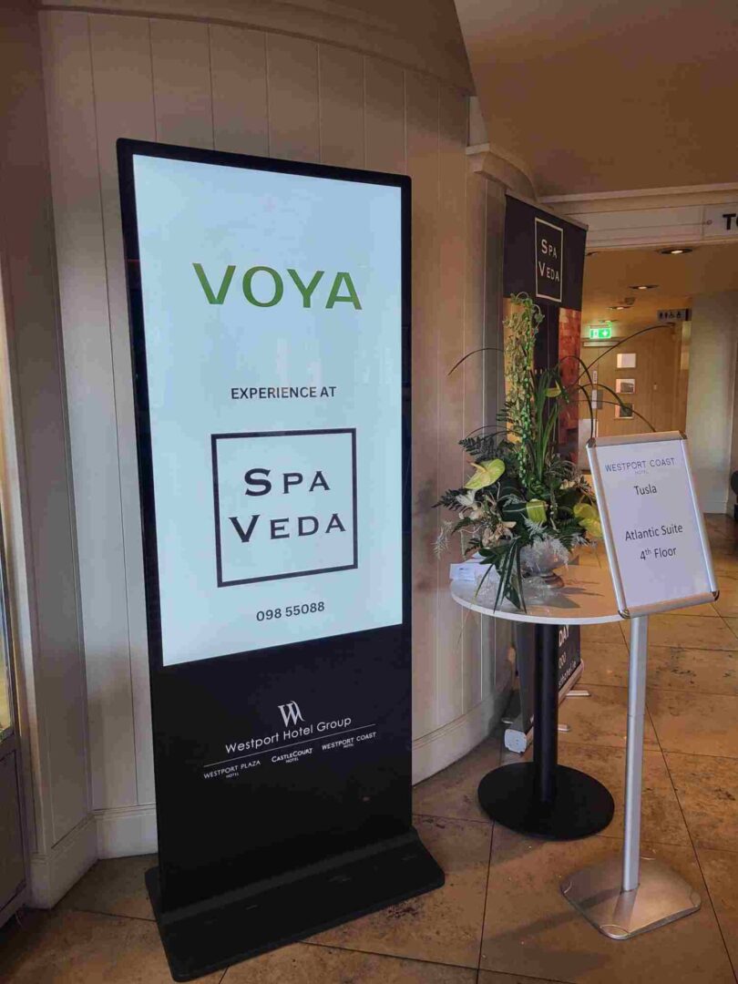 Freestanding digital poster for a hotel lobby